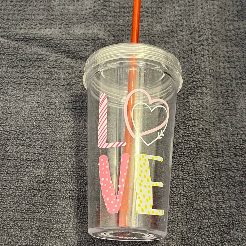 Love multicolor cup with straw in good condition